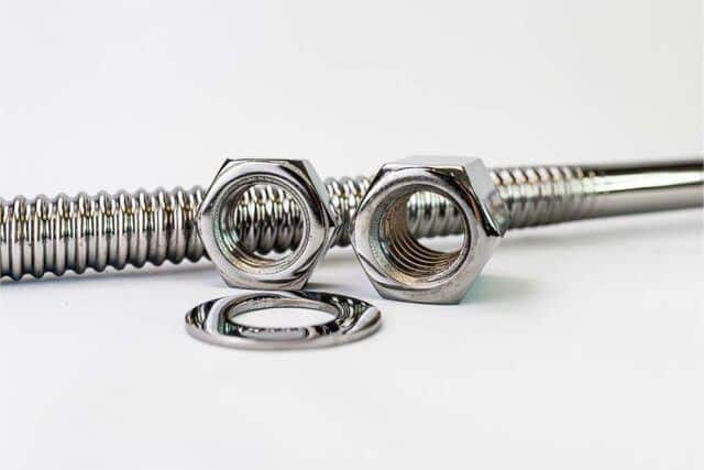 Domestic Fasteners, including a bolt, washer, and rod, manufactured domestically by Dyson Corporation.